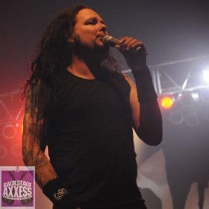 Singer singing in Korn Rochester armory event