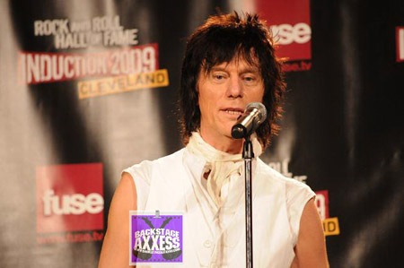 Jeff Beck giving a speech shown in the picture